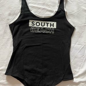 Black bodysuit. Worn once